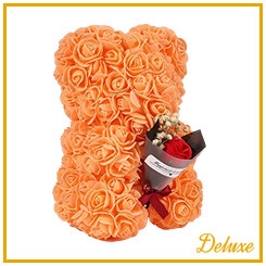 <h4>Beer DELUXE op standaard 25cm oranje met boeket in luxe cadeauverpakki</h4>