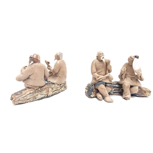 Two chinese men on a trunk, unglazed, height 7cm, box 6 or 12 pcs.