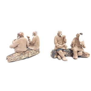 Two chinese men on a trunk, unglazed, height 7cm, box 6 or 12 pcs.