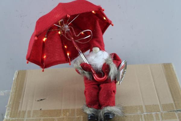 <h4>Deco Kerstman Met Paraplu L 40</h4>